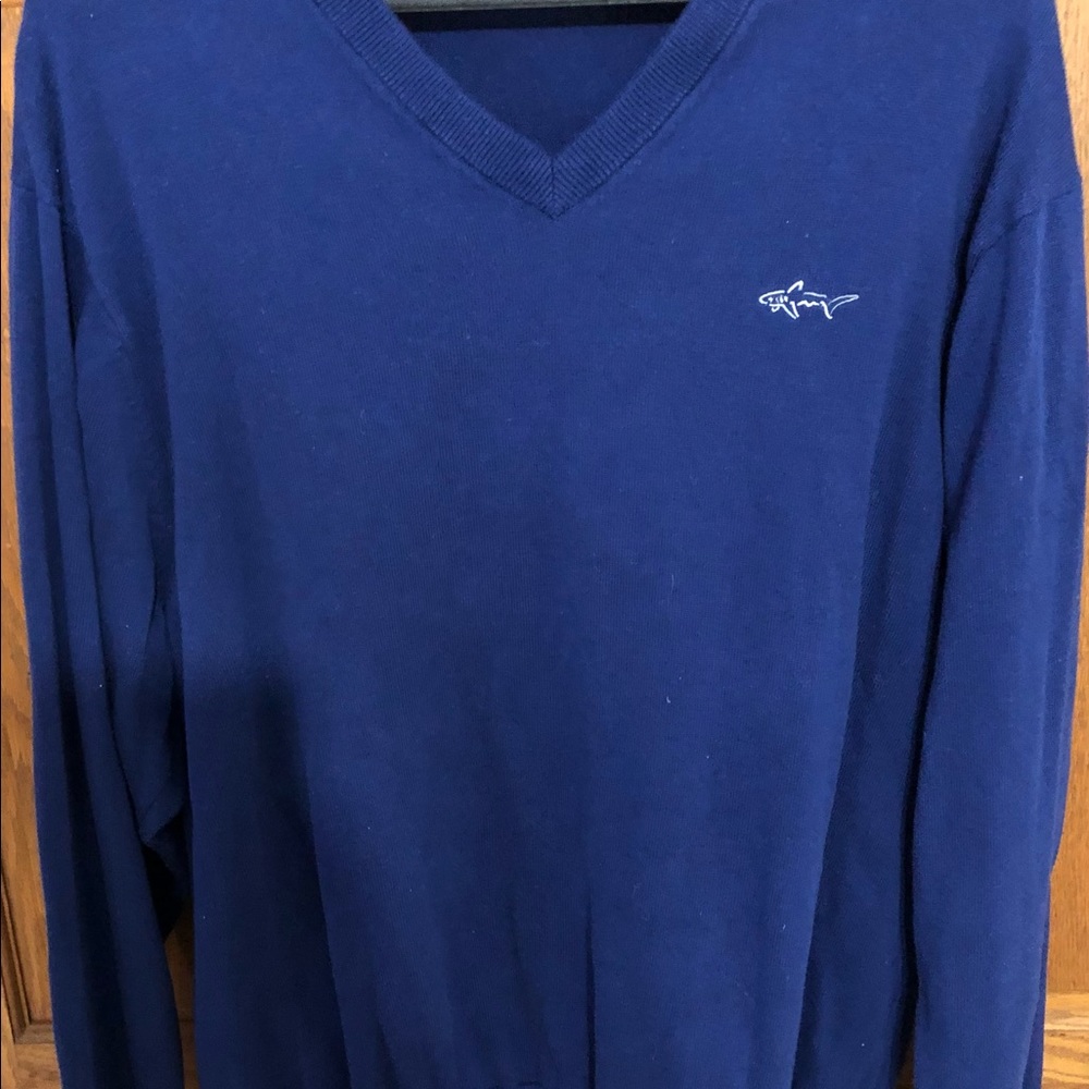 Greg Norman long sleeve pullover shirt.
